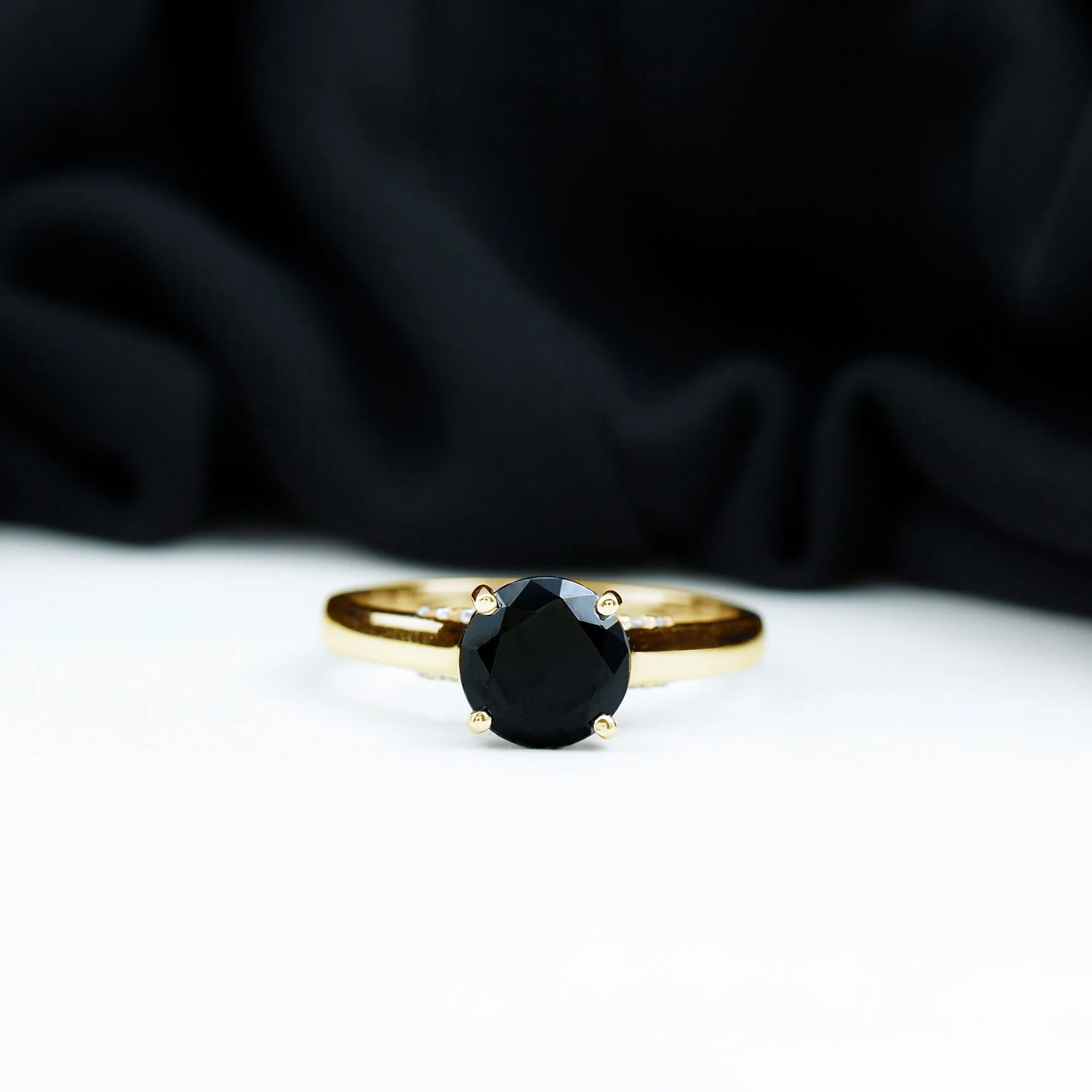 Classic Black Onyx Solitaire Ring with Surprise Diamond Accent