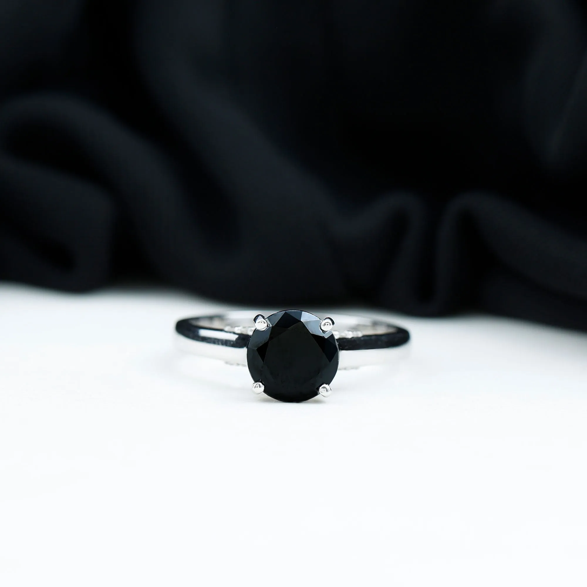 Classic Black Onyx Solitaire Ring with Surprise Diamond Accent