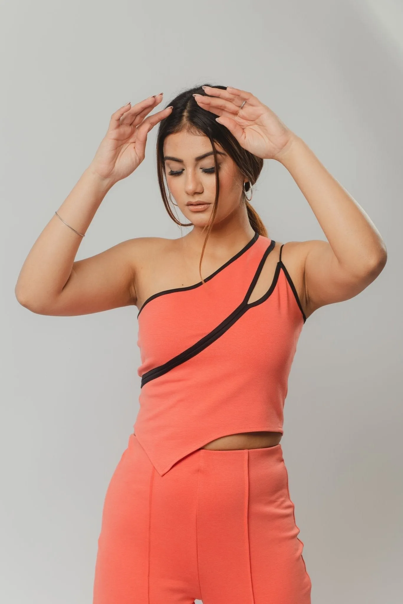 Cutting Edge Knit Top in Coral
