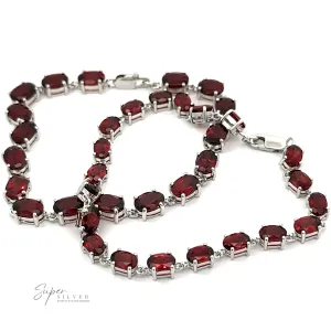 Pronged Garnet Bracelet With Rhodium Finish