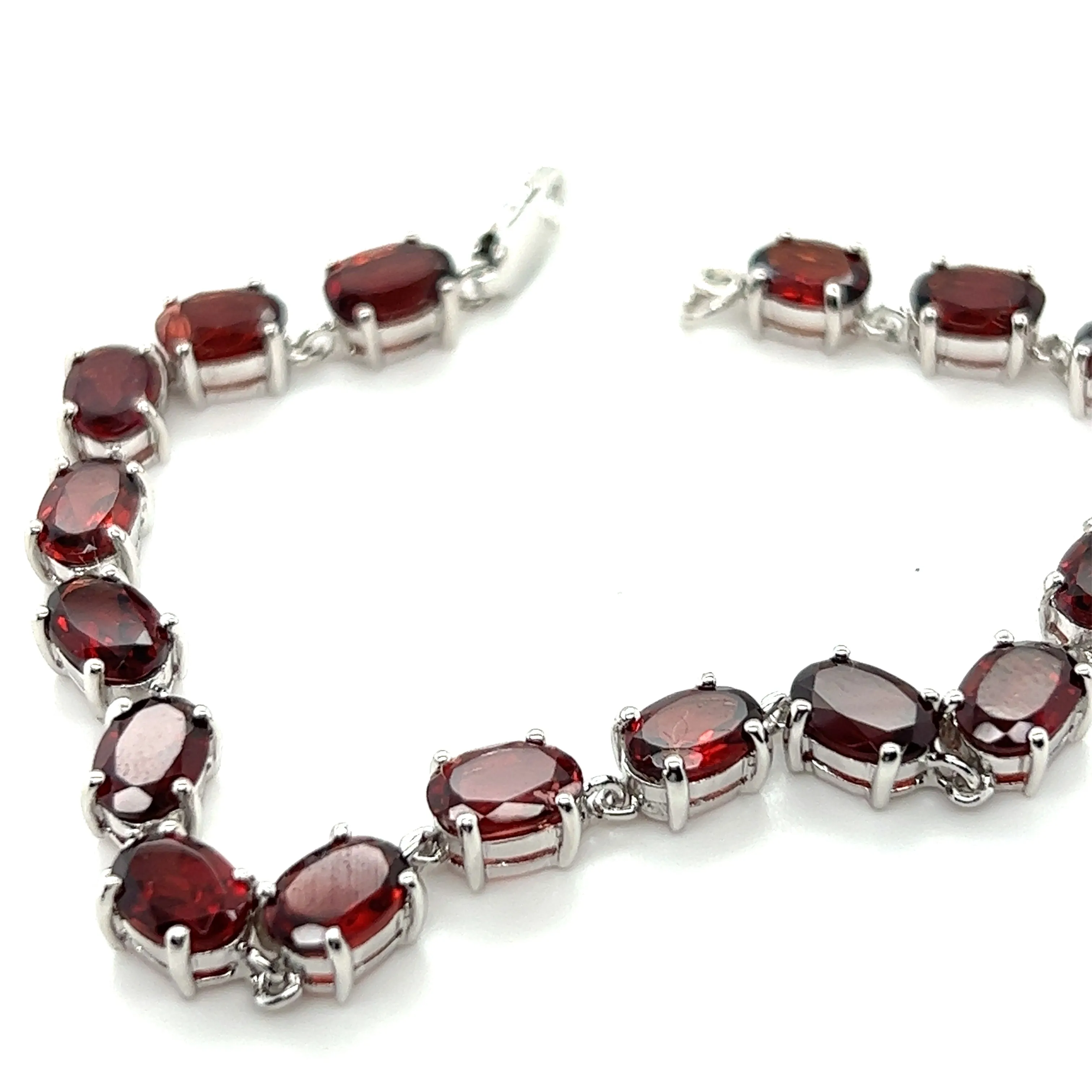 Pronged Garnet Bracelet With Rhodium Finish